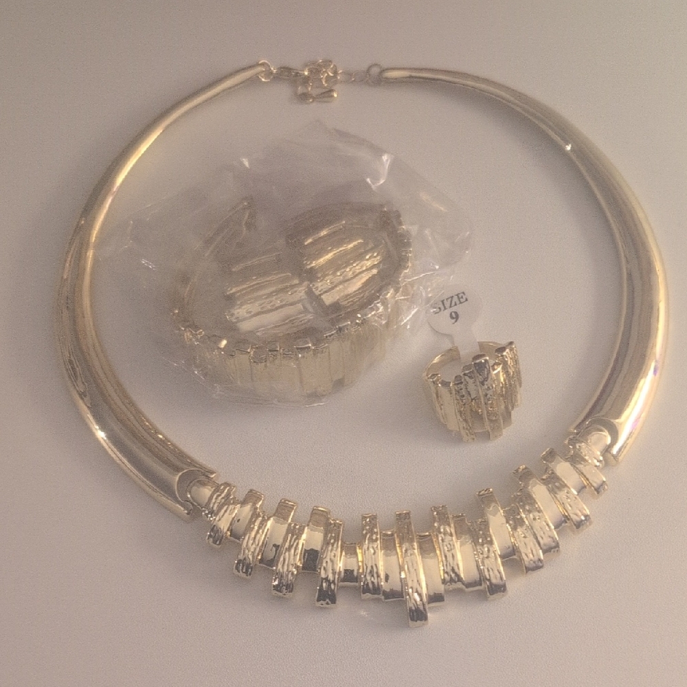 Elegant Gold Necklace, Bracelet, and Ring Set